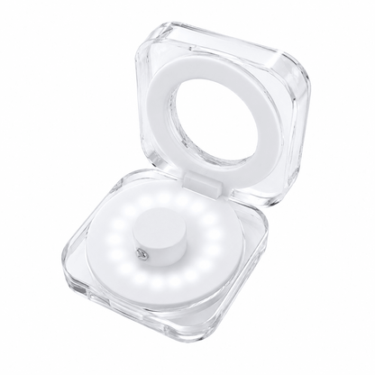 Open clear smart ring charging case with white LED ring and central charging post