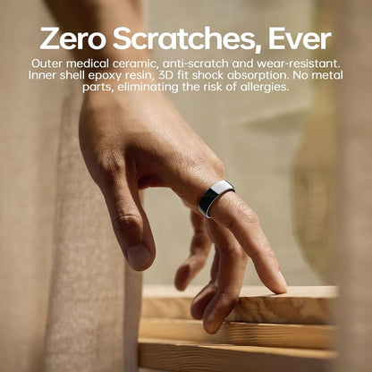 Hand wearing black and white ceramic smart ring under scratch-resistant material details