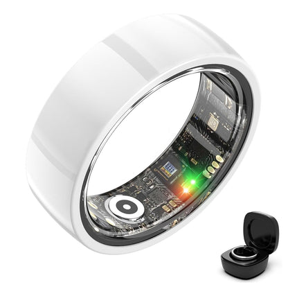 White ceramic smart ring with transparent sensor lining and black charging case on white