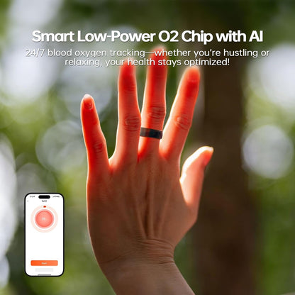 Backlit hand wearing black ceramic smart ring beside phone showing 99% blood oxygen reading